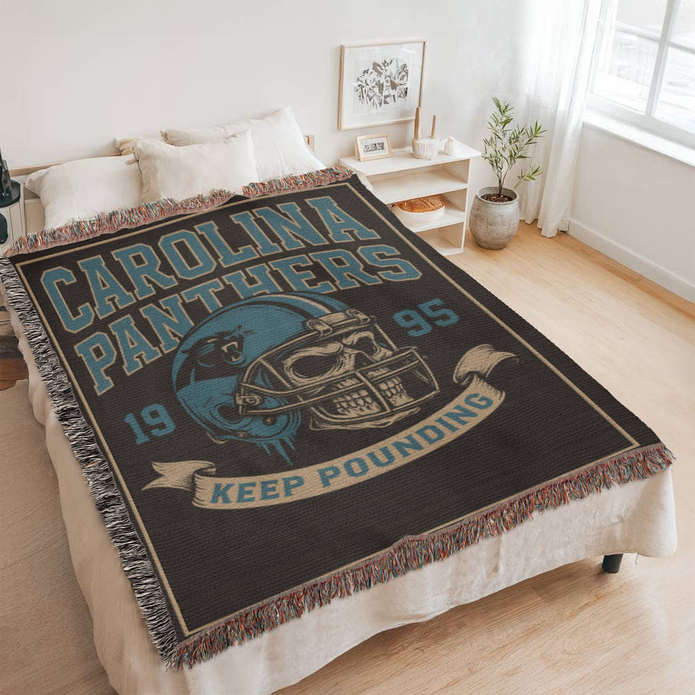 Carolina Panthers Woven Blanket – “Keep Pounding” Vintage Skull Helmet Design